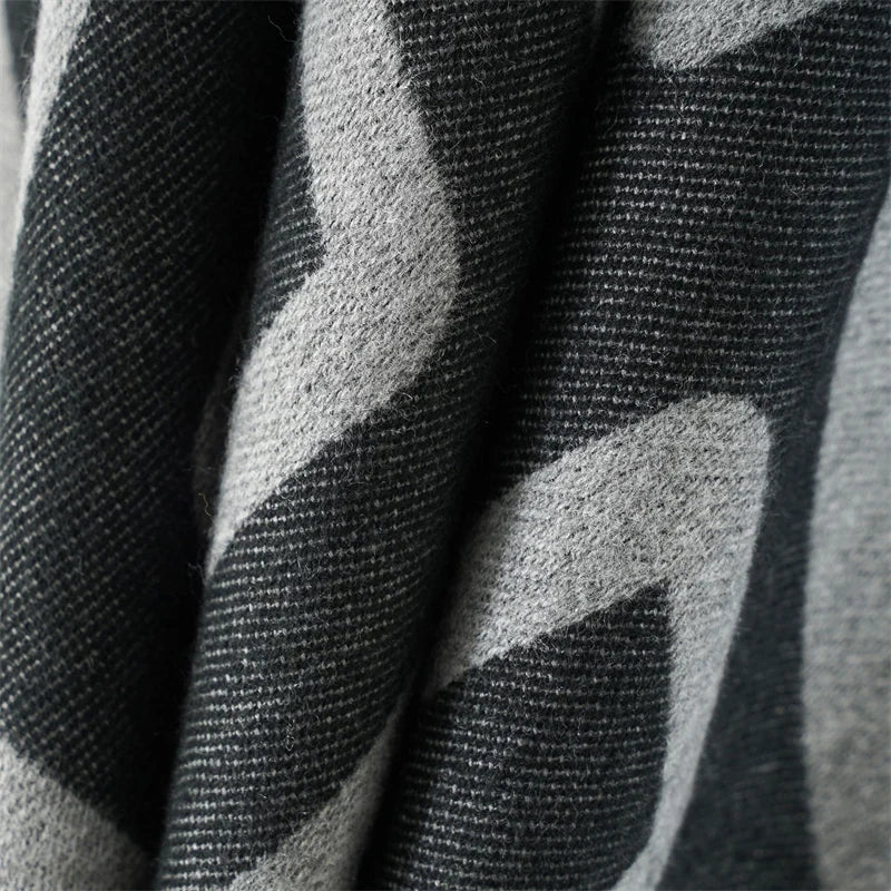 Borbón - Monochrome Labyrinth Poncho – Bold Balance in Black and Light Grey